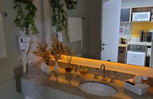 Et badeværelse på Flat Sunshine - Granja Brasil Resort - Itaipava + 26 billeder