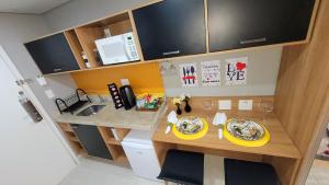 Køkken eller tekøkken på Flat Sunshine - Granja Brasil Resort - Itaipava