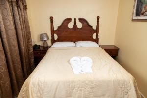Letto o letti in una camera di Hotel Internacional Palmerola