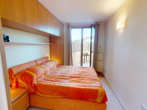 Posteľ alebo postele v izbe v ubytovaní Charmant 2 pièces avec terrasse, jardin et parking dans résidence avec piscine à Menton - FR-1-196-313