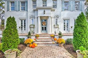 a house with pumpkins in front of it at Stunning Charlotte Home Private Pool! in Charlotte
