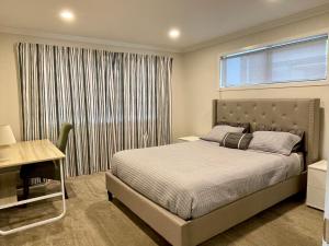 Krevet ili kreveti u jedinici u okviru objekta Flat Bush Private Ensuite