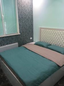 Säng eller sängar i ett rum på Ashtarak-2 LUX Apartment