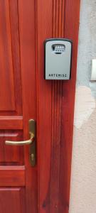 a wooden door with an activate sign on it at Marble Apartment -near Buda castle in Budapest