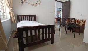 PRAKRITI HOMESTAY Fortkochi Air Conditioned Rooms的休息区
