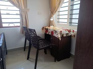 PRAKRITI HOMESTAY Fortkochi Air Conditioned Rooms的休息区