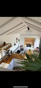 a kitchen and living room with a couch and a table at Minihane Sapanca in Sapanca