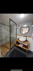 a bathroom with a sink and a mirror at Minihane Sapanca in Sapanca