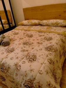 Кровать или кровати в номере Da Ale e Cate - In centro a San Benedetto