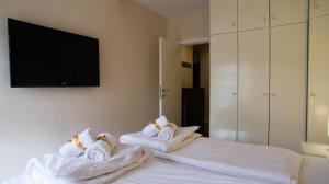Cama o camas de una habitación en True Color Apartment