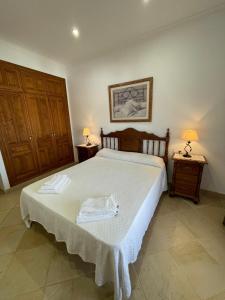 A bed or beds in a room at Casa Gonzalez