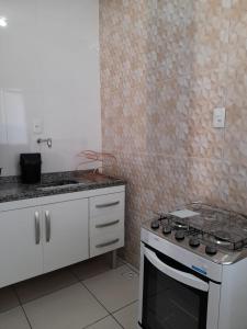 Kjøkken eller kjøkkenkrok på hospedagem recanto do sábia 5