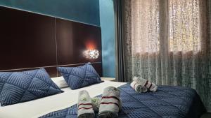 Giường trong phòng chung tại Manu's Guest Suite