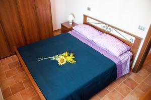 Posteľ alebo postele v izbe v ubytovaní Cascina La Romana
