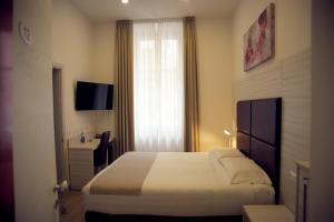 TV a/nebo společenská místnost v ubytování Hotel Fioralba