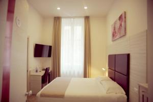 TV a/nebo společenská místnost v ubytování Hotel Fioralba
