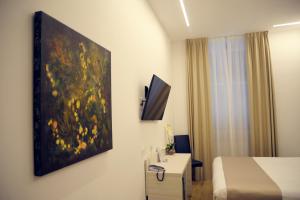 TV a/nebo společenská místnost v ubytování Hotel Fioralba