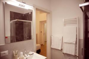Koupelna v ubytování Hotel Fioralba