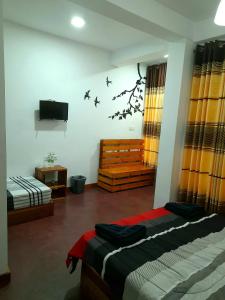 A bed or beds in a room at Water Side Residence