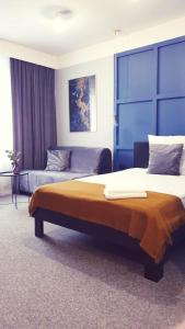 Posteľ alebo postele v izbe v ubytovaní Hotel Prowincja