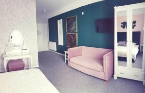 Posteľ alebo postele v izbe v ubytovaní Hotel Prowincja