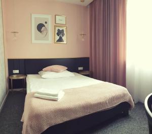 Posteľ alebo postele v izbe v ubytovaní Hotel Prowincja