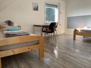 Postel nebo postele na pokoji v ubytování Monteurunterkunft Haus 19