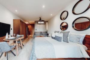 Säng eller sängar i ett rum på Volta 406 +15 foton