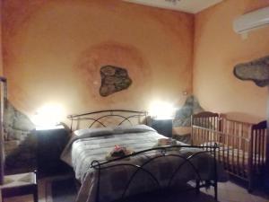 En eller flere senge i et værelse på Casa vacanza da Rosy
