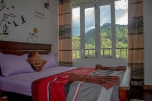 A bed or beds in a room at Water Side Residence