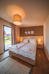 Postel nebo postele na pokoji v ubytování TERMAL KRE-SPA