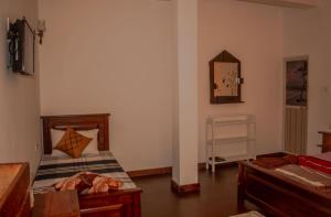 A bed or beds in a room at Water Side Residence
