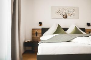 Postel nebo postele na pokoji v ubytování Imi Appartement