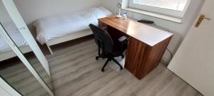 Ein Bett oder Betten in einem Zimmer der Unterkunft Hanover Fair Rooms