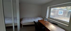 Ein Bett oder Betten in einem Zimmer der Unterkunft Hanover Fair Rooms