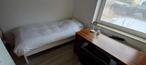 Ein Bett oder Betten in einem Zimmer der Unterkunft Hanover Fair Rooms