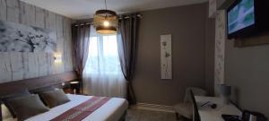 Televisi dan/atau pusat hiburan di Hotel Belle Vue