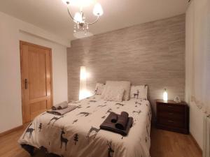 Ένα ή περισσότερα κρεβάτια σε δωμάτιο στο ALOJAMIENTO MIRABUENOS