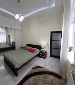 Un pat sau paturi într-o cameră la В.APART