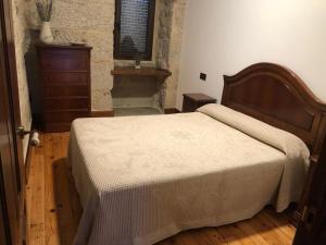Łóżko lub łóżka w pokoju w obiekcie Casa Lisboana