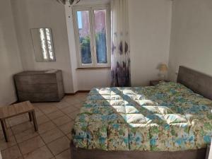 Posteľ alebo postele v izbe v ubytovaní La Casa sull'argine + 2 fotografie