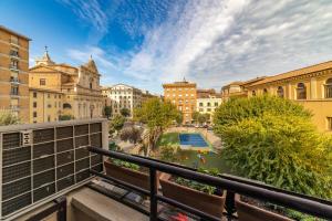 a view of a city from a balcony at Saint Peter House Station in Rome