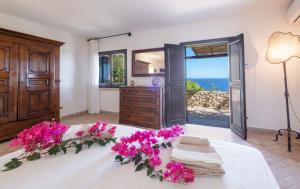 Ένα ή περισσότερα κρεβάτια σε δωμάτιο στο Villa Méditerranée Luxury Sea View