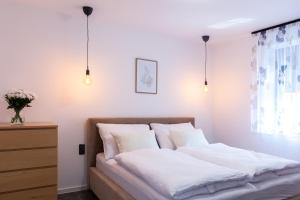 Posteľ alebo postele v izbe v ubytovaní CHALET HOUBOVÝ VRCH