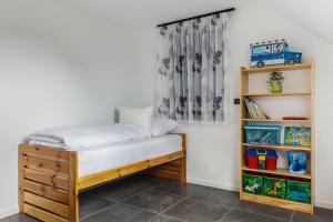 Posteľ alebo postele v izbe v ubytovaní CHALET HOUBOVÝ VRCH