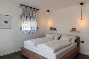 Posteľ alebo postele v izbe v ubytovaní CHALET HOUBOVÝ VRCH