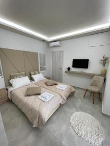 Postel nebo postele na pokoji v ubytování Sea View Apts & Suites by Pachiplex + 37 fotografií