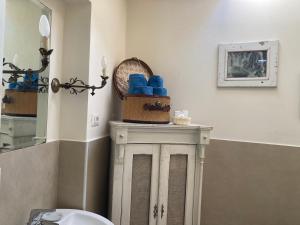 a bathroom with a sink and a toilet in a room at BLQ 01boutique B&B in Bologna