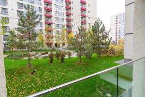 a view of a park with trees and buildings at 21 Residence Studio in Bucharest