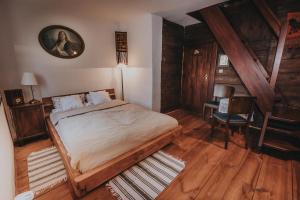 Säng eller sängar i ett rum på Sady Błotnica Dom Gościnny
